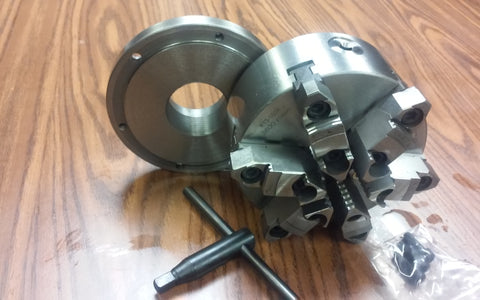 6" - 6 jaw self-centering lathe chuck with 1-1/2"-8 back mounting adapter plate.