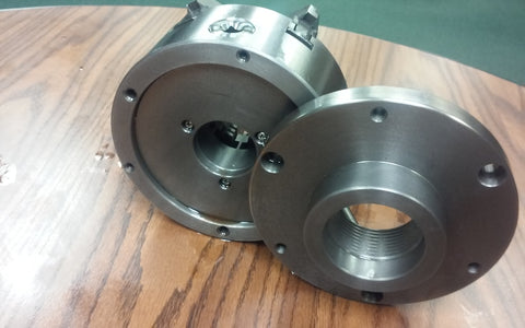 6" - 6 jaw self-centering lathe chuck with 1-1/2"-8 back mounting adapter plate.